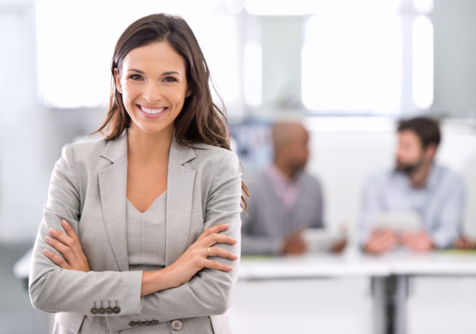 Shot of a young businesswoman standing in an office